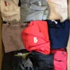 The photo shows a package with clothing in the category U.