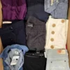 The photo shows a package with clothing in the category U.
