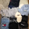 The photo shows a package with clothing in the category U.