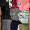 The photo shows a package with clothing in the category U.
