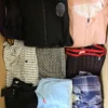 The photo shows a package with clothing in the category U.