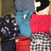 The photo shows a package with clothing in the category U.