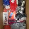 The photo shows a package with clothing in the category ABW.