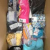 The photo shows a package with clothing in the category ABW.