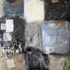 The photo shows a package with clothing in the category T.