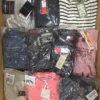 OT234 1 The photo shows a package with clothing in the category T.