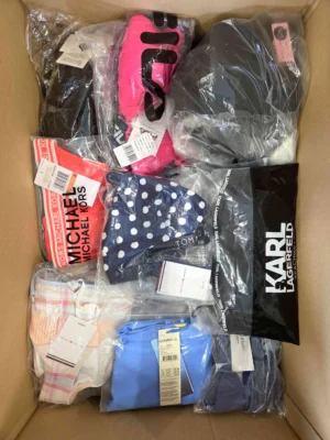 The photo shows a package with clothing in the category ABW.
