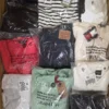 OT239 1 The photo shows a package with clothing in the category T.