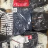 The photo shows a package with clothing in the category T.