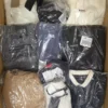 OT243 2 The photo shows a package with clothing in the category T.