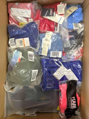 The photo shows a package with clothing in the category ABW.
