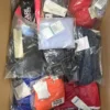 The photo shows a package with clothing in the category ABW.