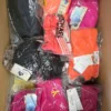 The photo shows a package with clothing in the category ABW.