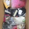 The photo shows a package with clothing in the category ABW.