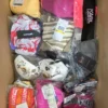 The photo shows a package with clothing in the category ABW.