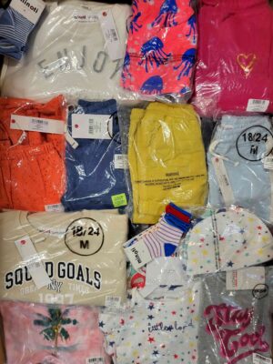 The photo shows a package with clothing in the category N.