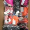 The photo shows a package with clothing in the category ABW.