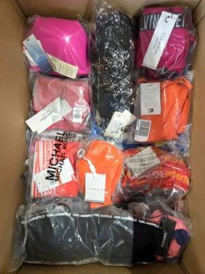The photo shows a package with clothing in the category ABW.