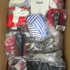 The photo shows a package with clothing in the category ABW.
