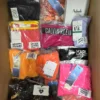The photo shows a package with clothing in the category ABW.