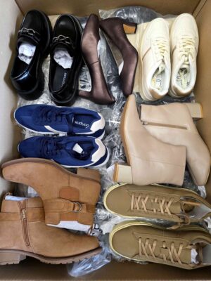 The photo shows a package with clothing in the category BPS.