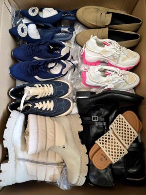 The photo shows a package with clothing in the category BPS.