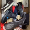 The photo shows a package with footwear in the category BS.