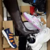 The photo shows a package with footwear in the category BS.