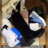 The photo shows a package with footwear in the category BS.