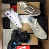 The photo shows a package with footwear in the category BS.