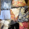 GB445 1 The photo shows a package with clothing in the category B.