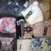 GB446 1 The photo shows a package with clothing in the category B.