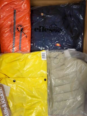 The photo shows a package with clothing in the category AJS.