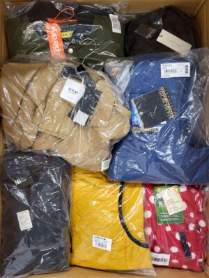 The photo shows a package with clothing in the category AJS.