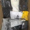 The photo shows a package with clothing in the category AM.