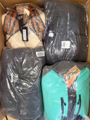 The photo shows a package with clothing in the category AJW.