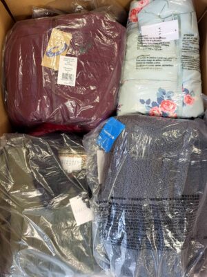 The photo shows a package with clothing in the category AJW.
