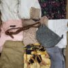 The photo shows a package with clothing in the category TSC.