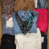 The photo shows a package with clothing in the category TSC.