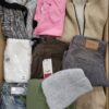 The photo shows a package with clothing in the category TSC.