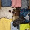 The photo shows a package with clothing in the category TSC.