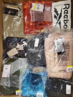 The photo shows a package with clothing in the category AW.