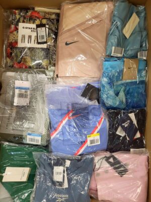 The photo shows a package with clothing in the category AW.