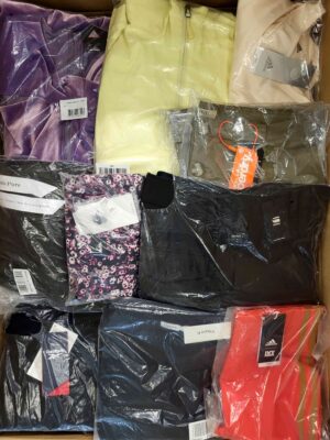 The photo shows a package with clothing in the category AW.