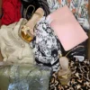 The photo shows a package with clothing in the category SN.