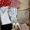 The photo shows a package with clothing in the category SN.