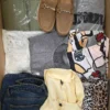 The photo shows a package with clothing in the category SN.