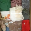 The photo shows a package with clothing in the category SN.
