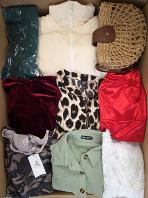 The photo shows a package with clothing in the category SN.