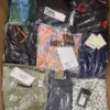 The photo shows a package with clothing in the category AP.